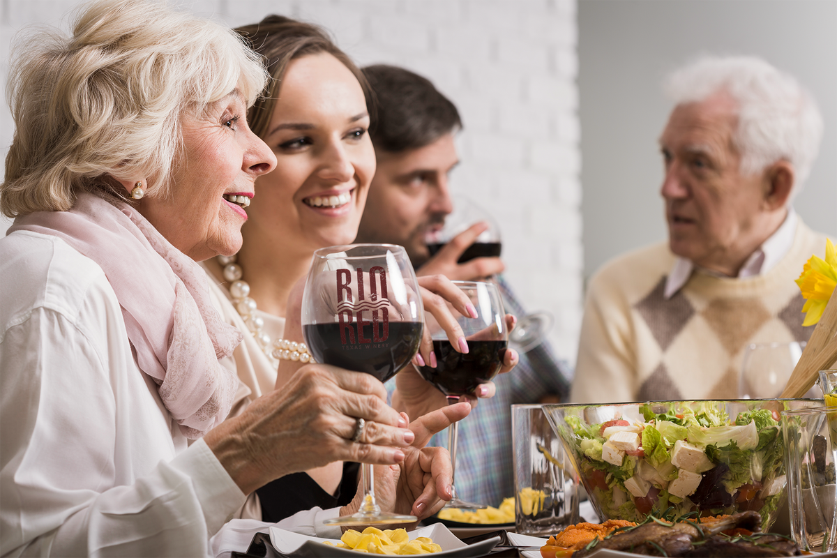 Senior woman holding a wine glass
